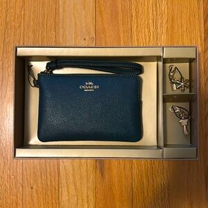 Coach Leather Wristlet (including 2 charms and gift box)